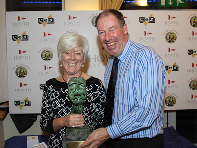 Rhianna Flannelly accepts the Lorna Townsend Trophy from Commodore Brian Turvey