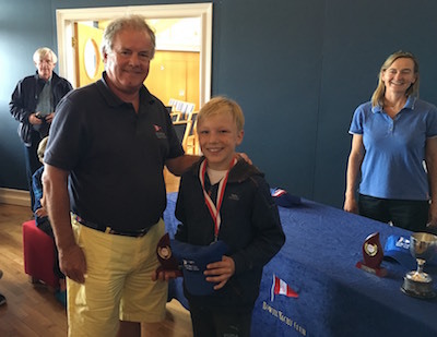 The Commodore presents the Regatta Fleet Silver Medal to Tadhg O'Callaghan