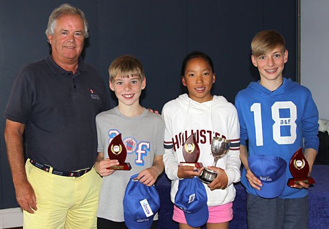 The Commodore on the 'Optimist Class Podium' with Luke Turvey (2nd), Leah Rickard (1st) and Hugh Turvey (3rd)