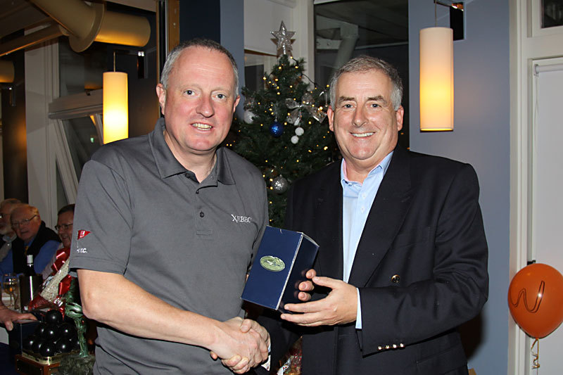 Eddie Bourke (Xebec) receives his prize from Commodore Joe McPeake