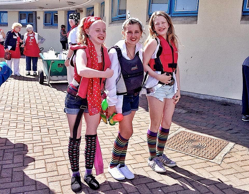 Anna, Ella and Alannah prepare for the day