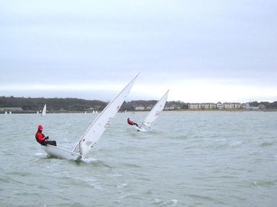 Laser fleet enjoy lots of wind for Frostbites