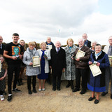 President Higgins with family members of wartime defense forces