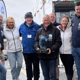 Doughnut - Dermot Skekan and crew with trophy.jpg