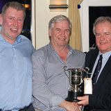 Colm Bermingham (Bite the Bullet) is presented with the 'Silver Wind Trophy' by Class 2 Captain Fergal Noonan and Commodore Berchmans Gannon